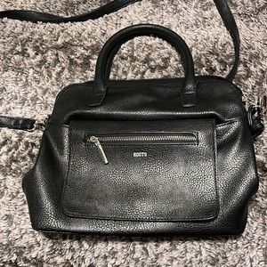 Roots black purse.